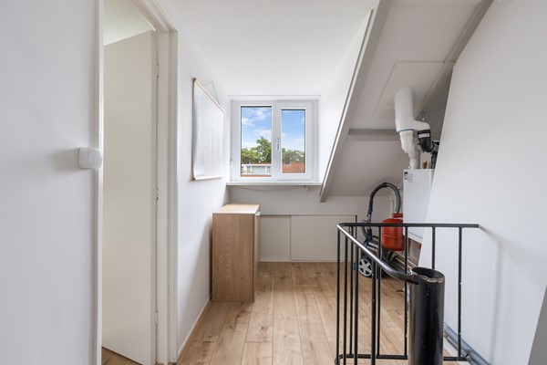 Foto - Te koop: Sfeervolle tussenwoning met groene oase!